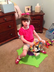 Lydia on her favorite toy